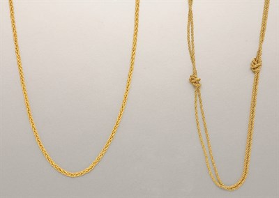 Lot 1295 - Double Strand Gold Necklace and Gold Chain Necklace