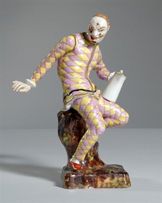 Lot 4232 - Continental Porcelain Figure of a Harlequin...
