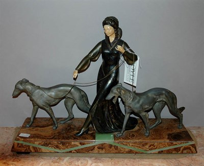 Lot 1187 - Art Deco Style Patinated-Metal Figure of a...