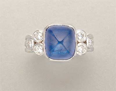 Lot 1320 - Cabochon Sapphire and Diamond Ring