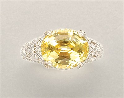 Lot 1326 - Yellow Sapphire and Diamond Ring