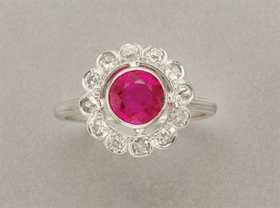 Lot 1362 - Pink Sapphire and Diamond Ring