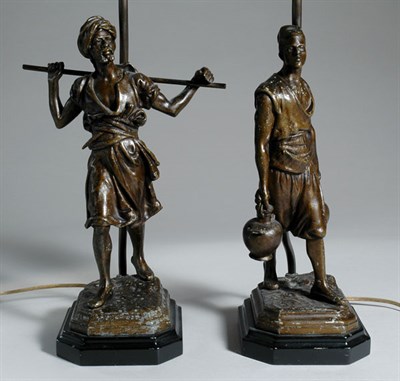 Lot 4451 - Pair of Arabic Patinated-Metal Figural Lamps...