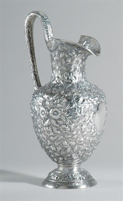 Lot 2238 - Sterling Silver Repousse Water Pitcher Marked...