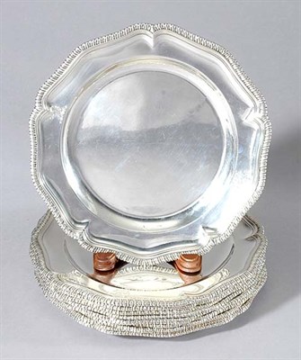 Lot 563 - Set of Twelve George III Silver Dinner Plates...