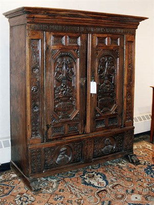 Lot 2123 - German Baroque Oak Schrank The rectangular...