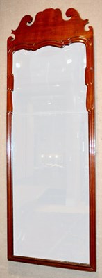 Lot 2165 - Queen Anne Mahogany Pier Mirror The scrolled...