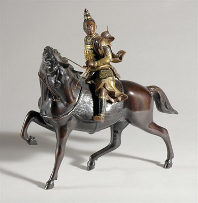 Lot 468 - Japanese Gilt and Patinated-Bronze Group of a...