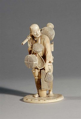 Lot 1053 - Japanese Ivory Okimono of a Basket Vendor Late...