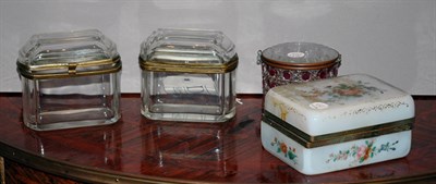 Lot 4240 - Four Gilt-Metal Mounted Glass Dresser Boxes