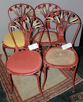 Lot 1157 - Set of Four Gilt Decorated Red Painted Metal...