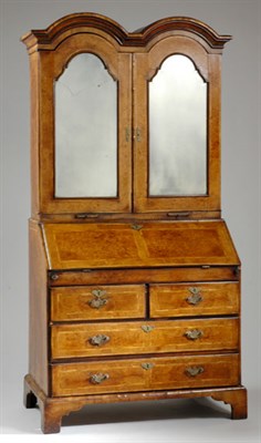 Lot 395 - George II Walnut Double-Dome Bureau Bookcase...