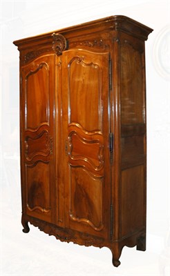 Lot 2429A - Louis XV Carved Walnut Armoire The rectangular...