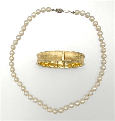 Lot 47 - Cultured Pearl Necklace and Gold Bangle