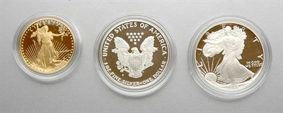 Lot 102 - U.S. $50 Gold Coin and U.S. Silver Dollars