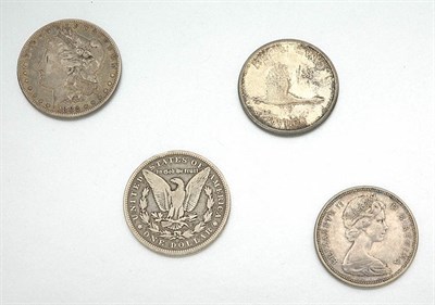 Lot 111 - Group of U.S. and Canadian Silver Dollars
