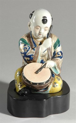 Lot 1025 - Japanese Enameled Porcelain Figure of a Boy...