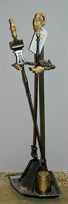 Lot 3394 - Set of Gilt and Patinated-Metal Fireplace Tools