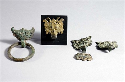 Lot 1170 - Five Bronze Fittings Han Dynasty Each in the...