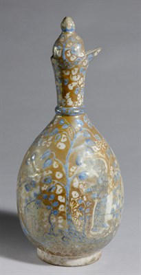 Lot 1418 - Persian Glazed Earthenware Ewer Of ovoid form,...