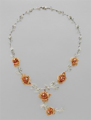 Lot 3058 - Two-Color Gold and Diamond Flower Necklace