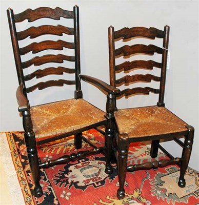 Lot 383 - Set of Six Fruitwood Ladder Back Rush Seat...