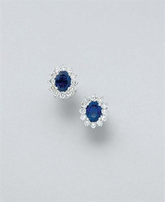 Lot 3329 - Pair of Sapphire and Diamond Earrings