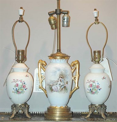 Lot 250 - Three Ceramic Lamps Including a pair of floral...
