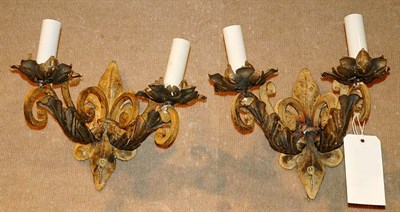 Lot 555 - Pair of Painted Metal Leaf Decorated Two-Light...