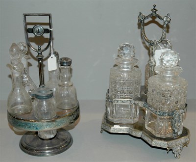 Lot 275 - Three Bottle Decanter Set in Silver Plated...