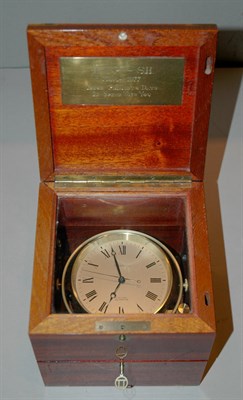 Lot 388 - Tiffany & Co. Brass Chronometer In mahogany case.