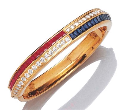 Lot 3487 - Gold, Ruby, Sapphire and Diamond Bangle