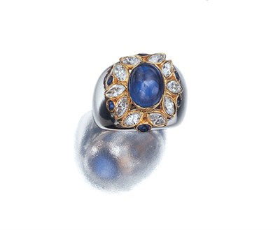 Lot 3526 - Two-Color Gold, Cabochon Sapphire and Diamond Ring