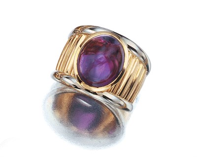 Lot 3525 - Two-Color Gold and Cabochon Amethyst Ring