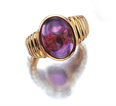 Lot 3450 - Gold and Cabochon Amethyst Ring
