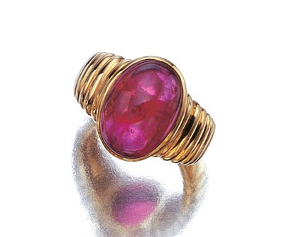 Lot 3449 - Gold and Cabochon Rubellite Ring