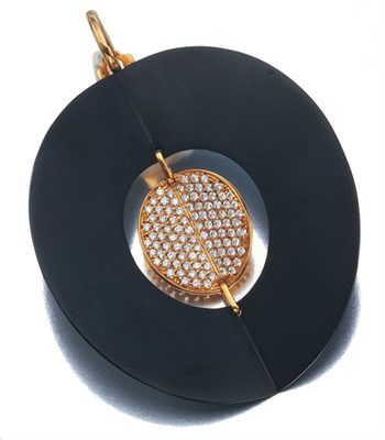 Lot 3545 - Gold, Anodized Steel and Diamond Pendant