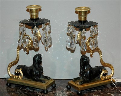 Lot 2551 - Pair of Regency Gilt and Patinated-Bronze...