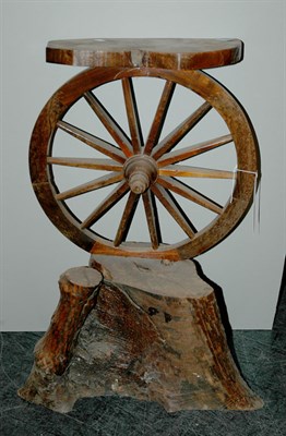 Lot 191A - Wheel Carved Tree Trunk Side Table