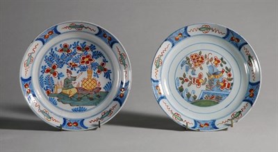 Lot 2176 - Two Dutch Delft Polychrome Decorated Plates...