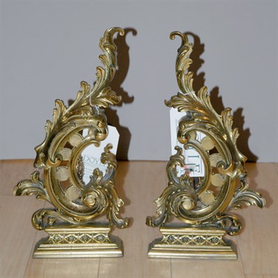 Lot 600 - Pair of Brass Chenets Height 14 1/2 inches.
