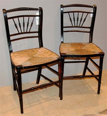 Lot 361 - Set of Six Regency Ebonized Rush Seat Side Chairs