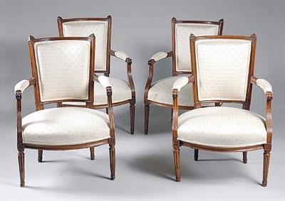 Lot 2459 - Four Similar Louis XVI Walnut Fauteuils Late...