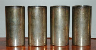 Lot 456 - Set of Four Cartier Sterling Silver Tumblers...