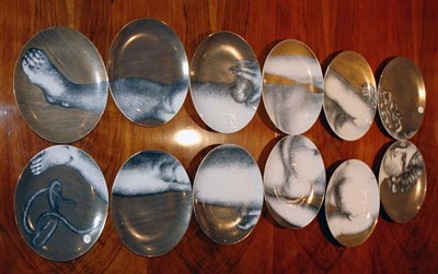Lot 176 - Set of Twelve Piero Fornasetti Porcelain Eva...