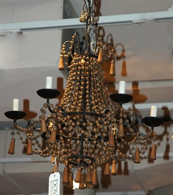Lot 553 - Turned Wood and Iron Six-Light Chandelier