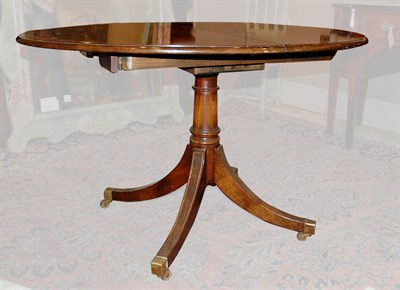 Lot 467 - Mahogany Single Pedestal Oval Table With two...