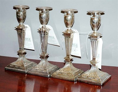 Lot 384 - Set of Four English Silver Candlesticks Early...