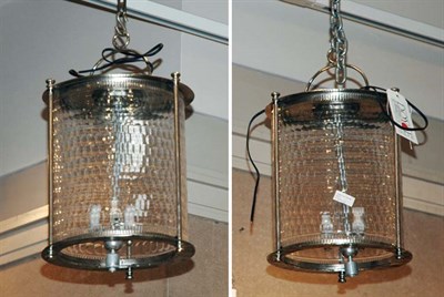 Lot 4427 - Pair of Metal and Glass Cylinder Lanterns