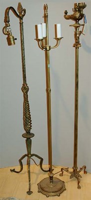 Lot 319 - Three Gilt-Metal Floor Lamps